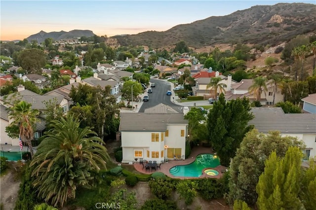 8042 Masefield Ct, West Hills, CA 91304 - aerial view of property and surrounding area featuring mountains and nearby suburban area