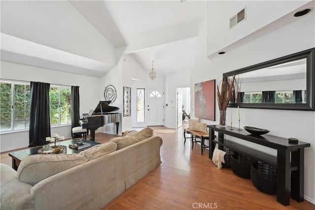 8042 Masefield Ct, West Hills, CA 91304 - living room with wood finished floors and high vaulted ceiling
