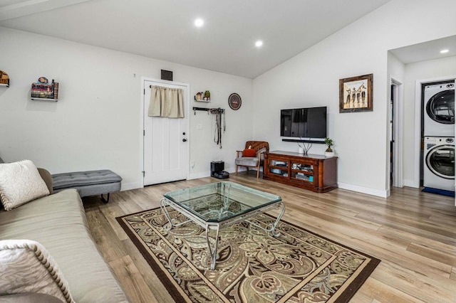 1254 13th St, Imperial Beach, CA 91932 - living area featuring estacked washer and dryer, lofted ceiling, light wood finished floors, and recessed lighting