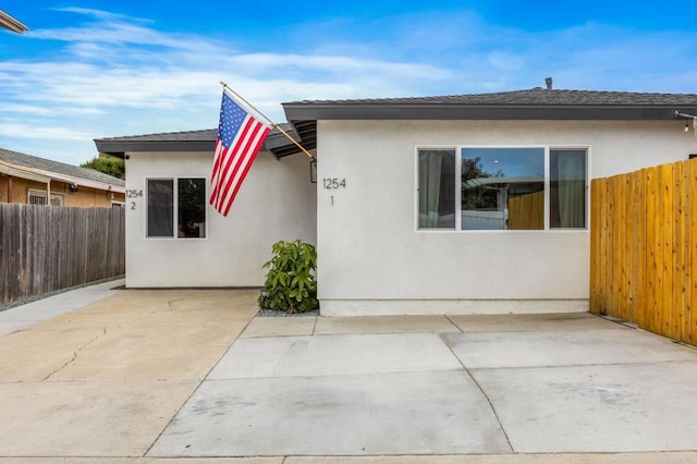 1254 13th St, Imperial Beach, CA 91932 - bungalow-style house with stucco siding and a patio