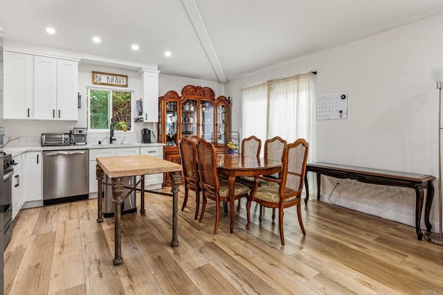 1254 13th St, Imperial Beach, CA 91932 - dining area featuring light wood-style flooring, recessed lighting, and decorative columns