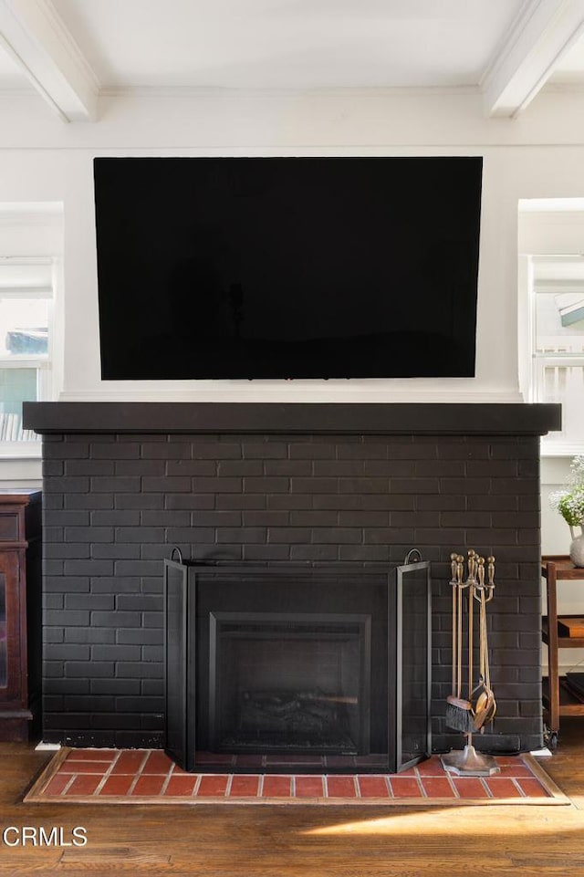 4207 Berenice Ave, Los Angeles, CA 90031 - detailed view of a brick fireplace, beam ceiling, wood finished floors, and crown molding