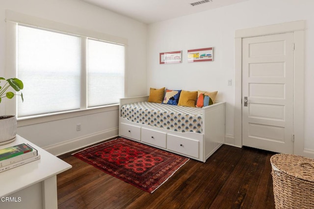 4207 Berenice Ave, Los Angeles, CA 90031 - bedroom featuring dark wood finished floors and baseboards