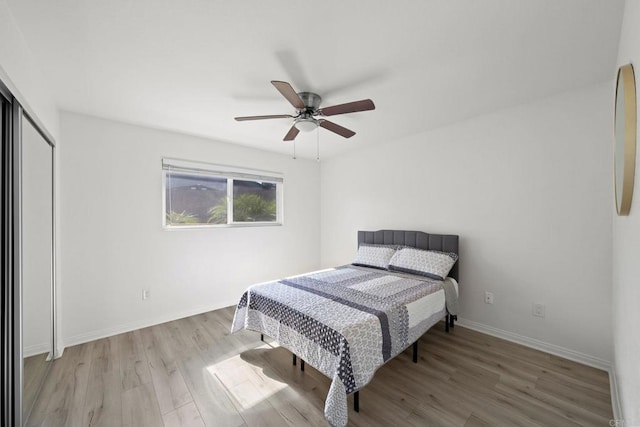 9860 Dale Ave Unit A8, Spring Valley, CA 91977 - bedroom featuring wood finished floors, a ceiling fan, and a closet