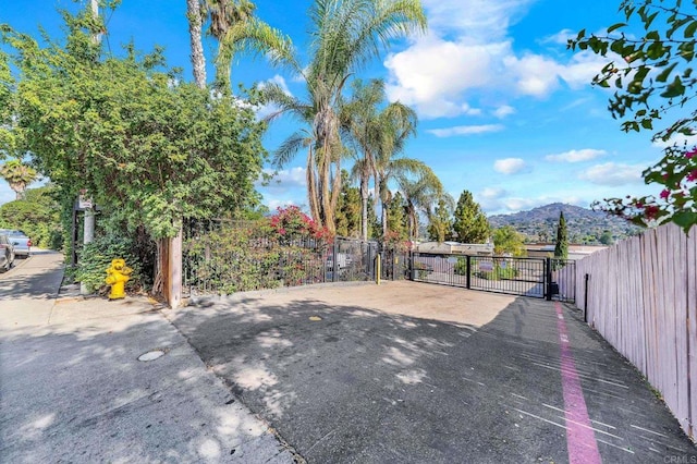 9860 Dale Ave Unit A8, Spring Valley, CA 91977 - view of yard featuring a gate and a mountain view