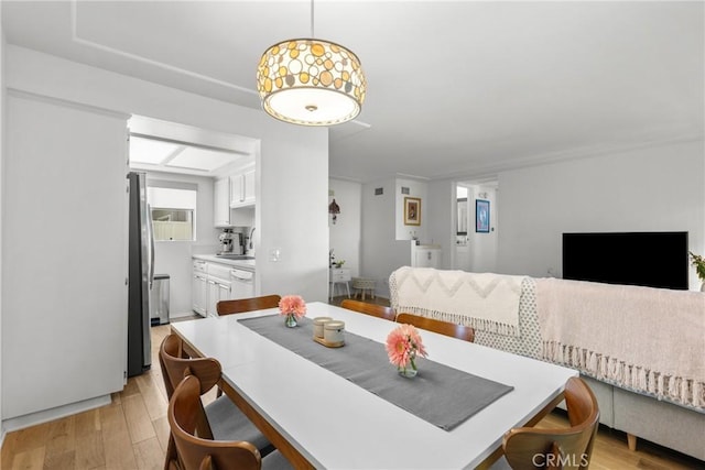4859 Coldwater Canyon Ave Unit 4, Sherman Oaks, CA 91423 - dining space with light wood-type flooring