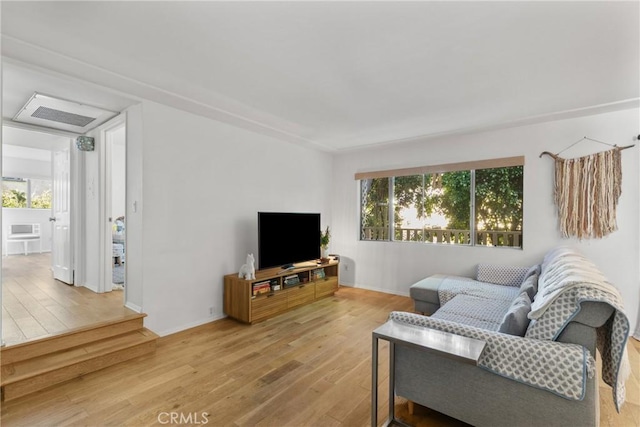 4859 Coldwater Canyon Ave Unit 4, Sherman Oaks, CA 91423 - living room featuring wood finished floors and healthy amount of natural light