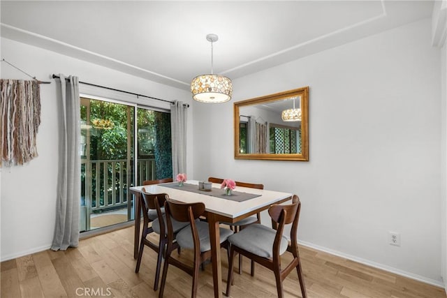 4859 Coldwater Canyon Ave Unit 4, Sherman Oaks, CA 91423 - dining space featuring light wood-type flooring and baseboards