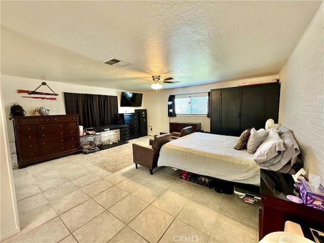 1602 W Dorothea Ave W, Visalia, CA 93277 - bedroom featuring light tile patterned floors, a textured ceiling, and ceiling fan