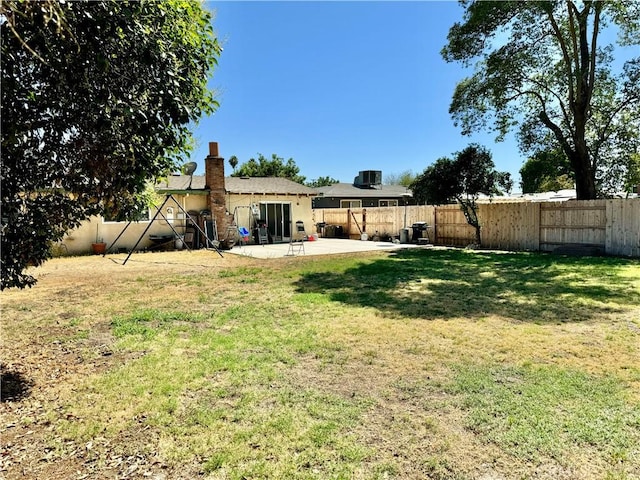 1602 W Dorothea Ave W, Visalia, CA 93277 - fenced backyard featuring a patio