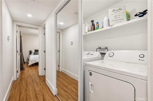 1124 S Citron Unit 85, Anaheim, CA 92805 - laundry room with washing machine and clothes dryer, light wood-type flooring, and recessed lighting