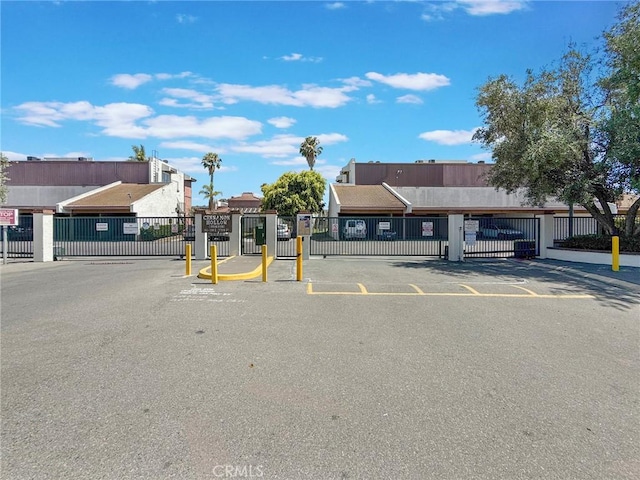 1124 S Citron Unit 85, Anaheim, CA 92805 - view of asphalt street featuring a gated entry and a gate