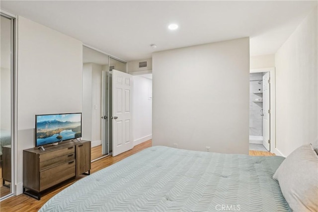1124 S Citron Unit 85, Anaheim, CA 92805 - bedroom with light wood-type flooring and recessed lighting