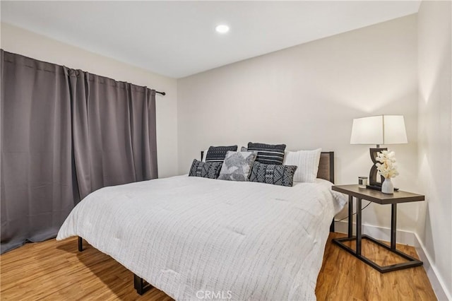 1124 S Citron Unit 85, Anaheim, CA 92805 - bedroom with wood finished floors and recessed lighting