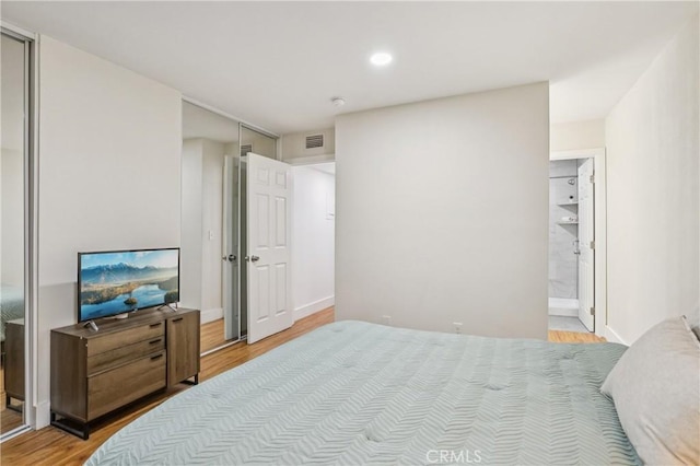 1124 S Citron Unit 85, Anaheim, CA 92805 - bedroom with light wood finished floors and recessed lighting