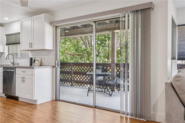 1124 S Citron Unit 85, Anaheim, CA 92805 - doorway featuring light wood-type flooring and recessed lighting