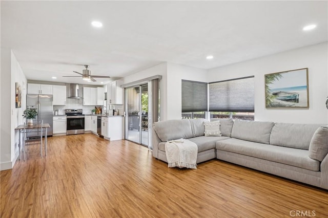1124 S Citron Unit 85, Anaheim, CA 92805 - living room featuring light wood-style flooring, recessed lighting, and a ceiling fan