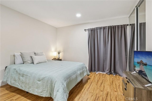 1124 S Citron Unit 85, Anaheim, CA 92805 - bedroom featuring light wood-style floors and recessed lighting