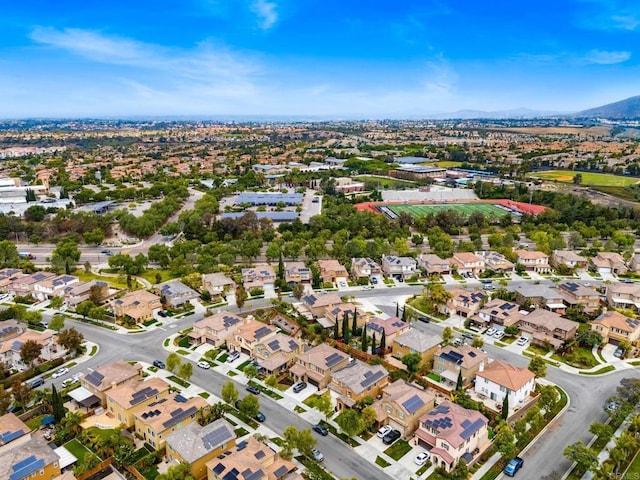 1789 Perrin Pl, Chula Vista, CA 91913 - aerial overview of property's location with nearby suburban area and a mountainous background