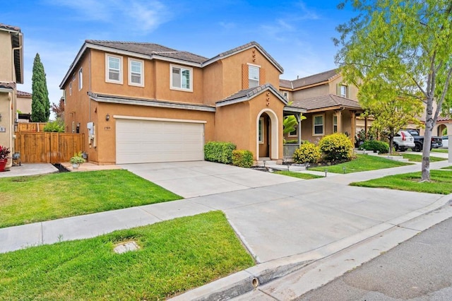 1789 Perrin Pl, Chula Vista, CA 91913 - view of front facade featuring an attached garage, stucco siding, driveway, and a tile roof