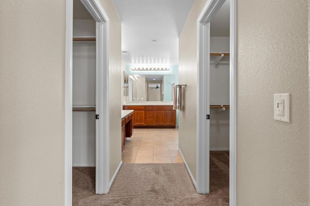 1789 Perrin Pl, Chula Vista, CA 91913 - corridor featuring light carpet and light tile patterned floors