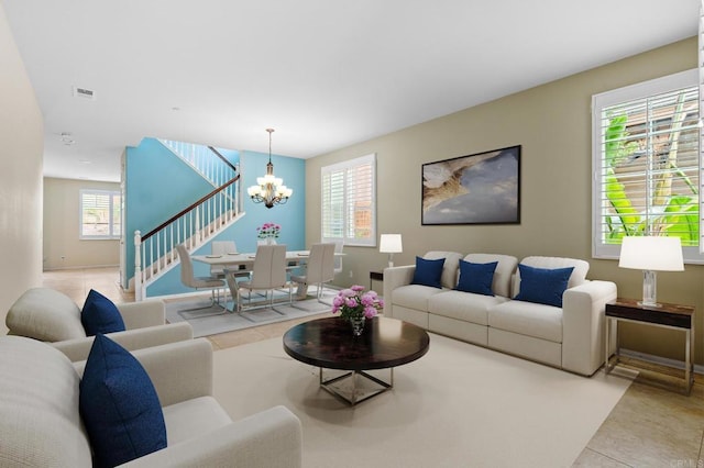 1789 Perrin Pl, Chula Vista, CA 91913 - living area featuring a chandelier, stairs, and light tile patterned flooring
