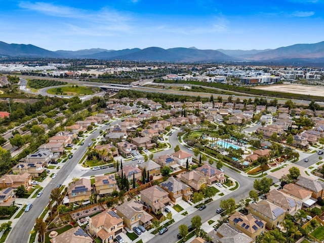 1789 Perrin Pl, Chula Vista, CA 91913 - aerial overview of property's location featuring nearby suburban area and a mountainous background