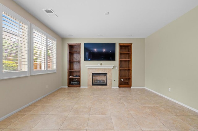 1789 Perrin Pl, Chula Vista, CA 91913 - unfurnished living room with built in features, a tile fireplace, and tile patterned floors