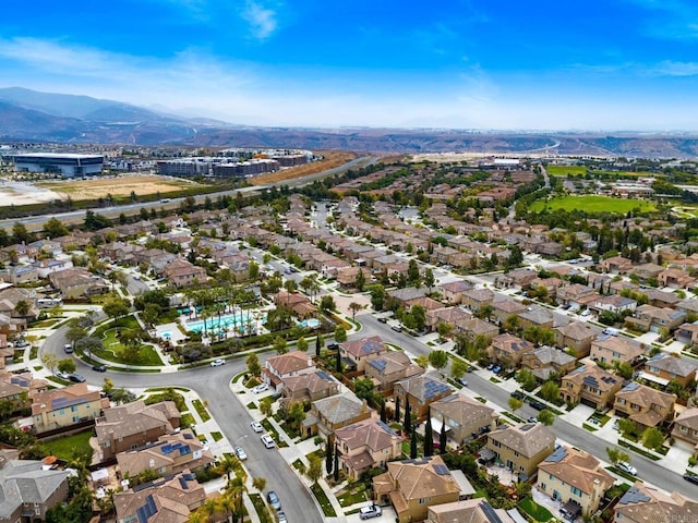 1789 Perrin Pl, Chula Vista, CA 91913 - aerial overview of property's location featuring a mountain backdrop and nearby suburban area