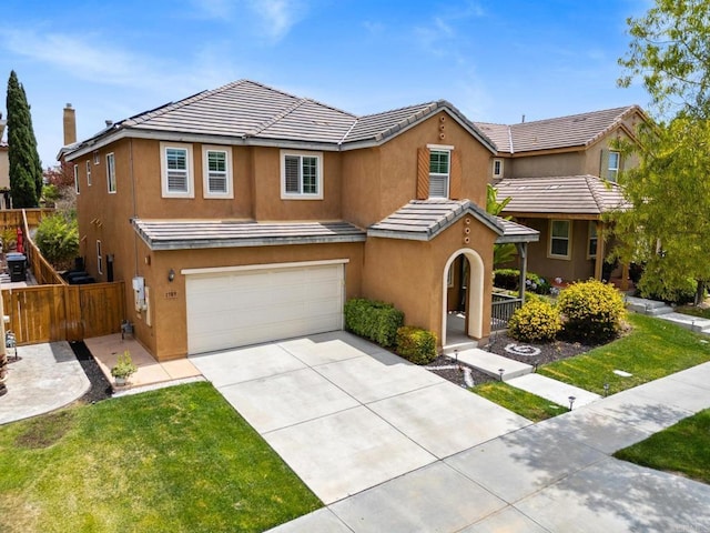 1789 Perrin Pl, Chula Vista, CA 91913 - view of front facade with stucco siding, an attached garage, concrete driveway, and a tiled roof