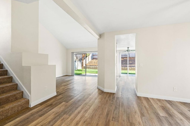 5149 Maplewood Cir, Oceanside, CA 92056 - spare room featuring wood finished floors, stairway, and vaulted ceiling