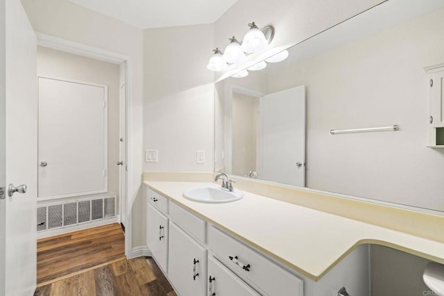 5149 Maplewood Cir, Oceanside, CA 92056 - bathroom featuring wood finished floors and vanity