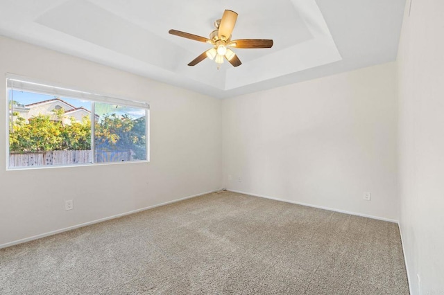 5149 Maplewood Cir, Oceanside, CA 92056 - carpeted empty room featuring a tray ceiling and ceiling fan