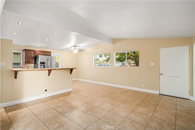 2017 W Newgrove St, Lancaster, CA 93536 - unfurnished living room with recessed lighting and light tile patterned floors