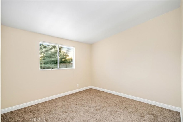 2017 W Newgrove St, Lancaster, CA 93536 - spare room featuring carpet floors and baseboards