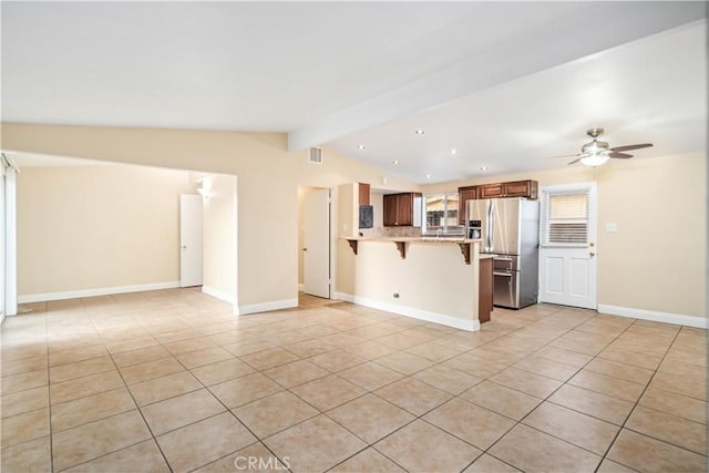 2017 W Newgrove St, Lancaster, CA 93536 - unfurnished living room featuring light tile patterned floors, ceiling fan, and recessed lighting
