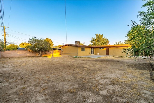 2017 W Newgrove St, Lancaster, CA 93536 - rear view of house with a patio area