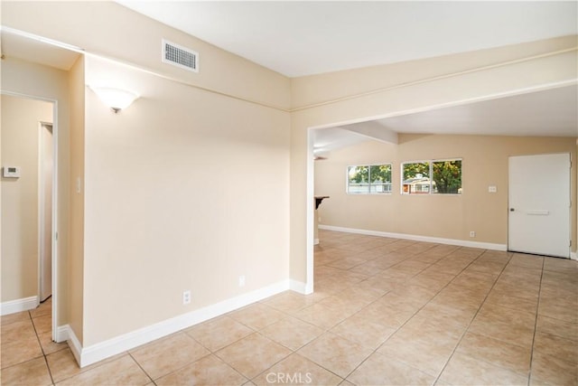 2017 W Newgrove St, Lancaster, CA 93536 - spare room with light tile patterned floors and baseboards