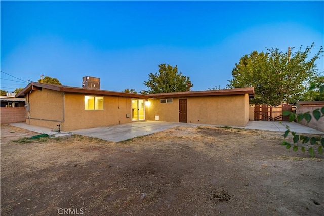 2017 W Newgrove St, Lancaster, CA 93536 - view of front of property with stucco siding and a patio