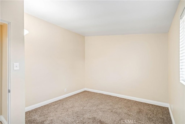 2017 W Newgrove St, Lancaster, CA 93536 - carpeted spare room featuring baseboards