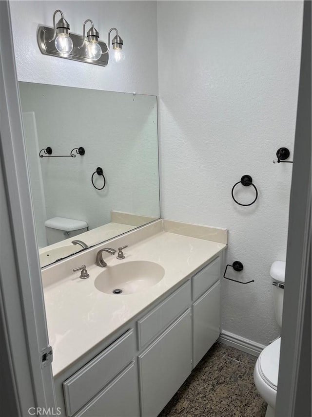 7711 Cartilla Ave, Fontana, CA 92336 - half bathroom with toilet and vanity