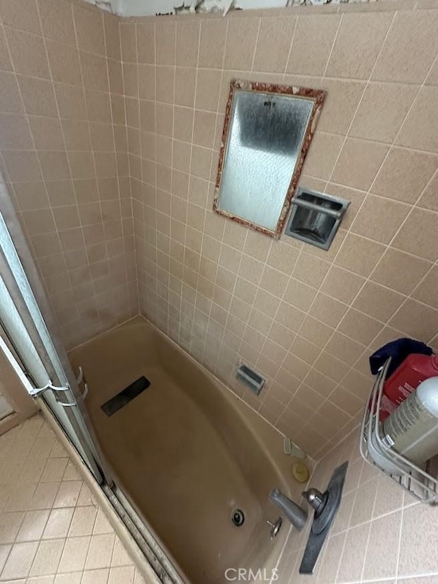 505 Cedar Ave Unit 2A, Long Beach, CA 90802 - bathroom featuring tile patterned flooring, a tile shower, and a bathtub