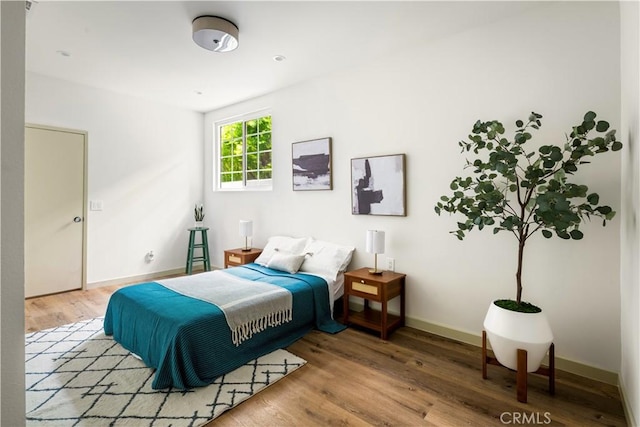 1030 Echo Park Ave, Los Angeles, CA 90026 - bedroom featuring wood finished floors and baseboards