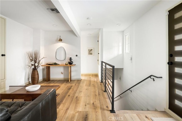 1030 Echo Park Ave, Los Angeles, CA 90026 - corridor featuring an upstairs landing and light wood finished floors