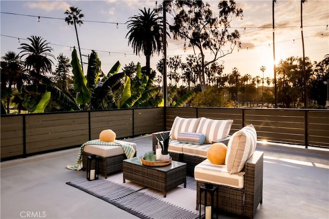 1030 Echo Park Ave, Los Angeles, CA 90026 - patio terrace at dusk with an outdoor living space and a patio