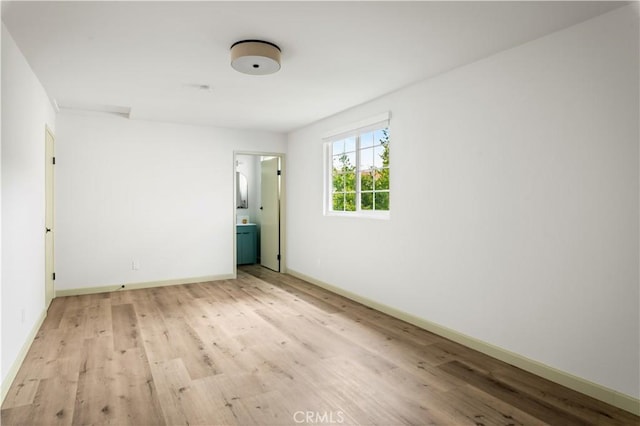 1030 Echo Park Ave, Los Angeles, CA 90026 - empty room with light wood-style floors and baseboards