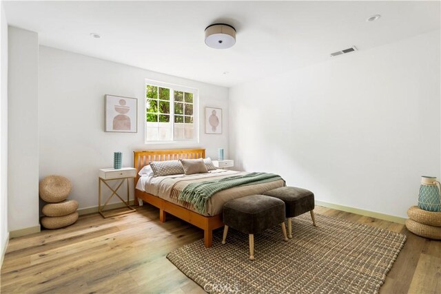 1030 Echo Park Ave, Los Angeles, CA 90026 - bedroom featuring wood finished floors and baseboards