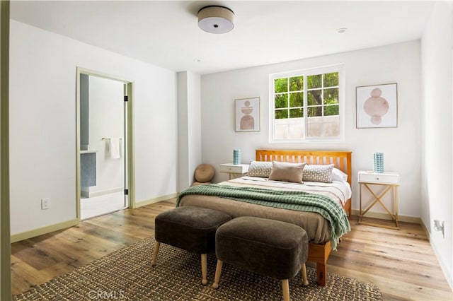 1030 Echo Park Ave, Los Angeles, CA 90026 - bedroom with wood finished floors and ensuite bathroom