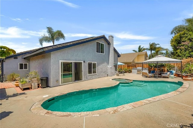 1358 Oakhurst Ct, Camarillo, CA 93010 - view of swimming pool featuring a patio, outdoor lounge area, and a pool with connected hot tub