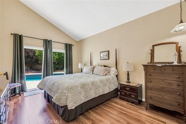 1358 Oakhurst Ct, Camarillo, CA 93010 - bedroom with access to outside, vaulted ceiling, and wood finished floors
